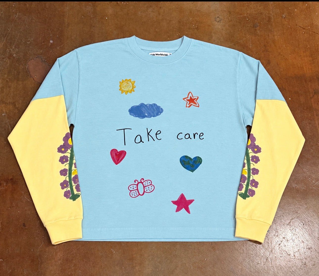 Evelynn World X Kids Worldwide  - Take Care Double Layered Longsleeve